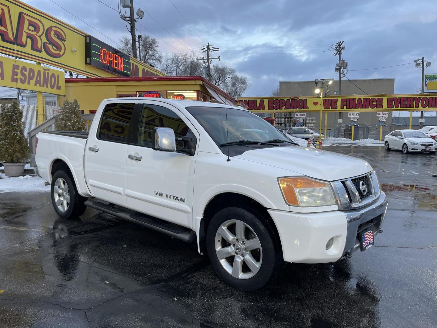 2008 Artic White /Black Nissan Titan LE Crew Cab 4WD SWB (1N6AA07C98N) with an 5.6L V8 DOHC 32V engine, 5-Speed Automatic Overdrive transmission, located at 801 South State Street, Salt Lake City, UT, 84111, (801) 328-0098, 40.751953, -111.888206 - Super clean nice truck! Runs great! 4x4 perfect all year around truck! Clean title no accidents on the Carfax history report! Features: 20 Inch Plus Wheels, Leather Seats, 4WD/AWD, Memory Seat(s), Alloy Wheels, Rockford Fosgate Sound, Front Seat Heaters, ABS Brakes, Automatic Transmission, Power L - Photo#5