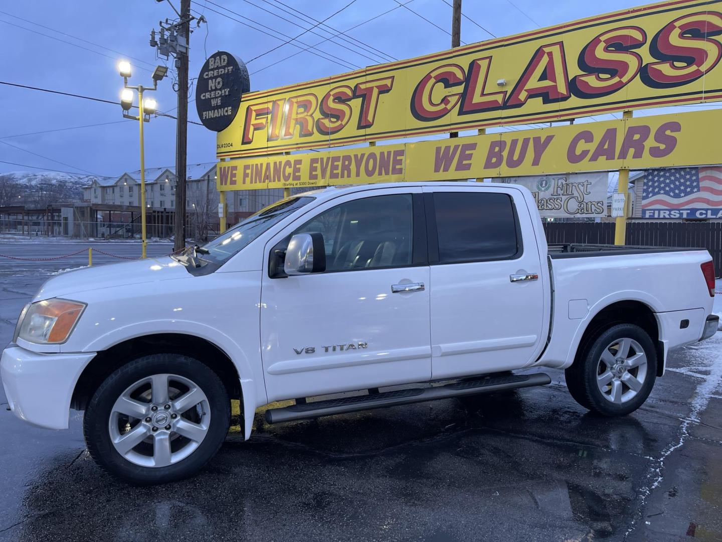 2008 Artic White /Black Nissan Titan LE Crew Cab 4WD SWB (1N6AA07C98N) with an 5.6L V8 DOHC 32V engine, 5-Speed Automatic Overdrive transmission, located at 801 South State Street, Salt Lake City, UT, 84111, (801) 328-0098, 40.751953, -111.888206 - Super clean nice truck! Runs great! 4x4 perfect all year around truck! Clean title no accidents on the Carfax history report! Features: 20 Inch Plus Wheels, Leather Seats, 4WD/AWD, Memory Seat(s), Alloy Wheels, Rockford Fosgate Sound, Front Seat Heaters, ABS Brakes, Automatic Transmission, Power L - Photo#13