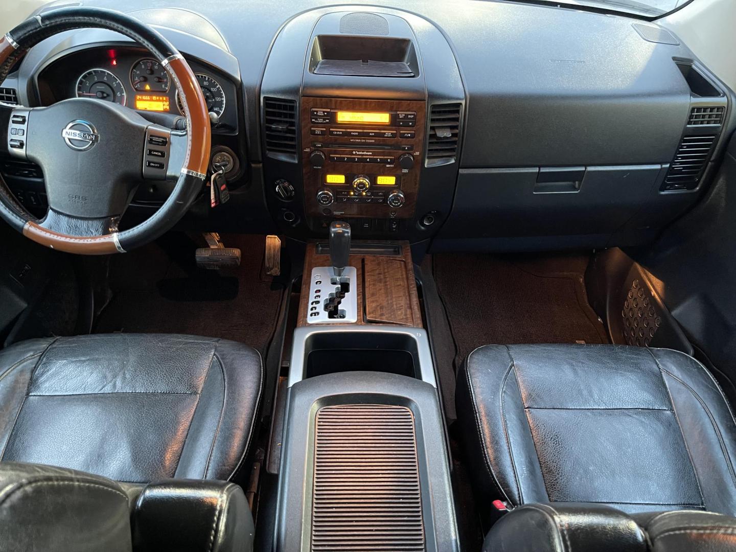 2008 Artic White /Black Nissan Titan LE Crew Cab 4WD SWB (1N6AA07C98N) with an 5.6L V8 DOHC 32V engine, 5-Speed Automatic Overdrive transmission, located at 801 South State Street, Salt Lake City, UT, 84111, (801) 328-0098, 40.751953, -111.888206 - Super clean nice truck! Runs great! 4x4 perfect all year around truck! Clean title no accidents on the Carfax history report! Features: 20 Inch Plus Wheels, Leather Seats, 4WD/AWD, Memory Seat(s), Alloy Wheels, Rockford Fosgate Sound, Front Seat Heaters, ABS Brakes, Automatic Transmission, Power L - Photo#16