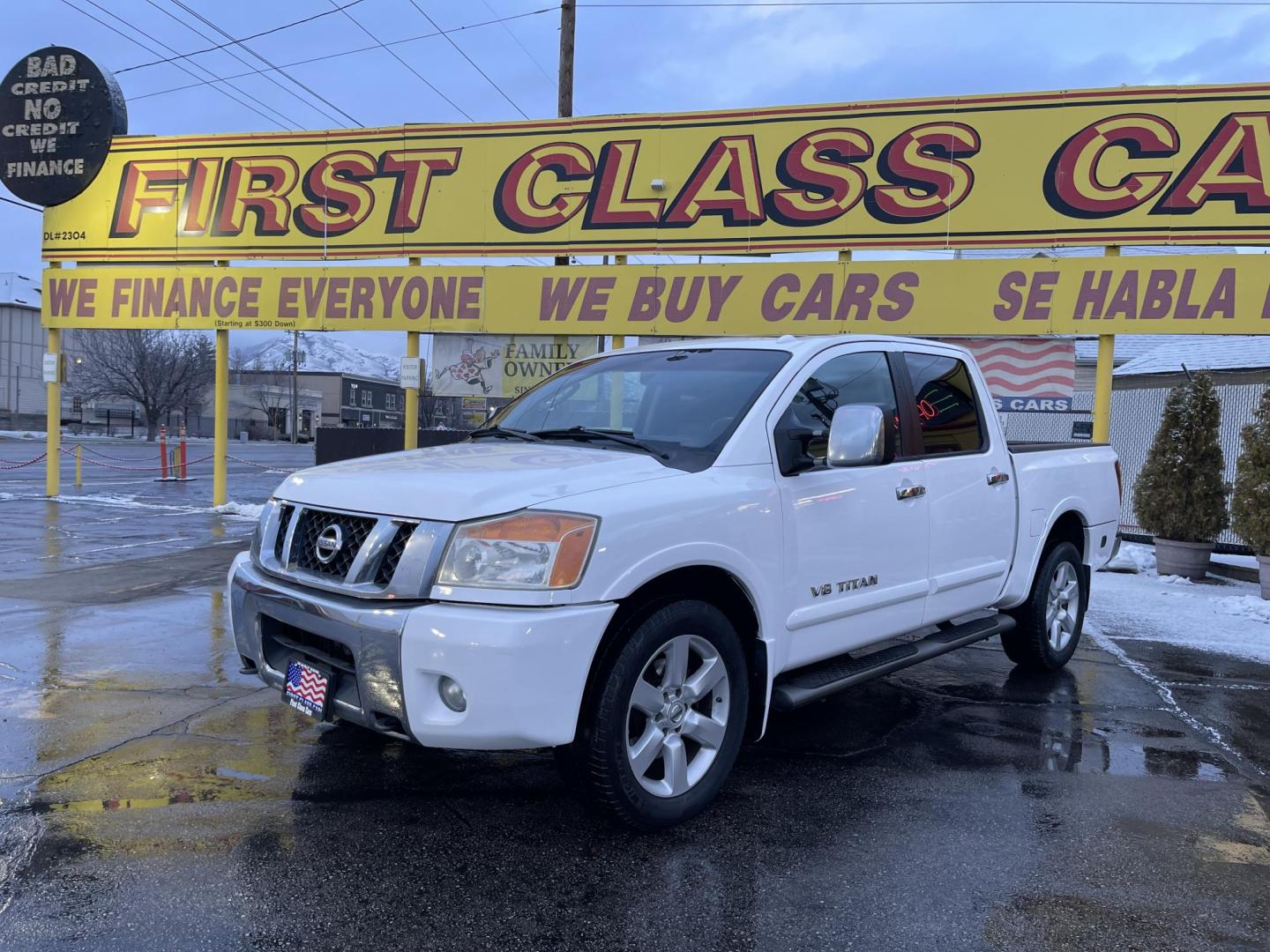 2008 Artic White /Black Nissan Titan LE Crew Cab 4WD SWB (1N6AA07C98N) with an 5.6L V8 DOHC 32V engine, 5-Speed Automatic Overdrive transmission, located at 801 South State Street, Salt Lake City, UT, 84111, (801) 328-0098, 40.751953, -111.888206 - Super clean nice truck! Runs great! 4x4 perfect all year around truck! Clean title no accidents on the Carfax history report! Features: 20 Inch Plus Wheels, Leather Seats, 4WD/AWD, Memory Seat(s), Alloy Wheels, Rockford Fosgate Sound, Front Seat Heaters, ABS Brakes, Automatic Transmission, Power L - Photo#0