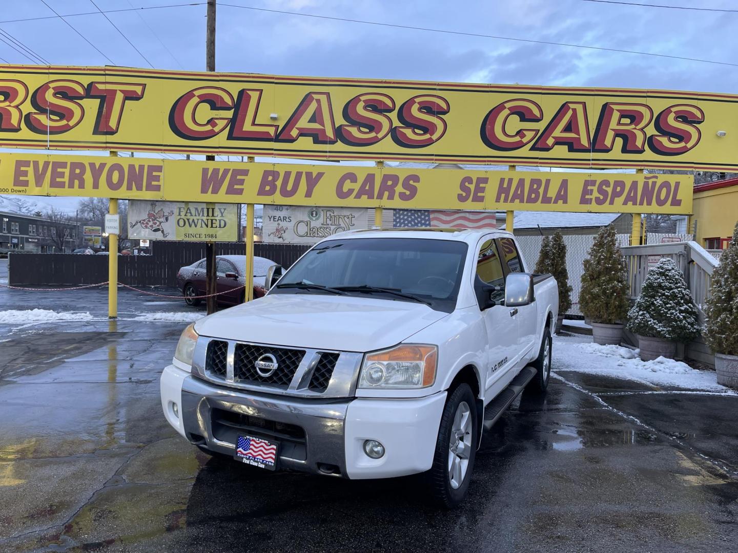 2008 Artic White /Black Nissan Titan LE Crew Cab 4WD SWB (1N6AA07C98N) with an 5.6L V8 DOHC 32V engine, 5-Speed Automatic Overdrive transmission, located at 801 South State Street, Salt Lake City, UT, 84111, (801) 328-0098, 40.751953, -111.888206 - Super clean nice truck! Runs great! 4x4 perfect all year around truck! Clean title no accidents on the Carfax history report! Features: 20 Inch Plus Wheels, Leather Seats, 4WD/AWD, Memory Seat(s), Alloy Wheels, Rockford Fosgate Sound, Front Seat Heaters, ABS Brakes, Automatic Transmission, Power L - Photo#1