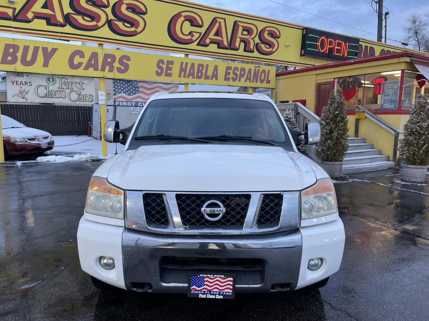 2008 Artic White /Black Nissan Titan LE Crew Cab 4WD SWB (1N6AA07C98N) with an 5.6L V8 DOHC 32V engine, 5-Speed Automatic Overdrive transmission, located at 801 South State Street, Salt Lake City, UT, 84111, (801) 328-0098, 40.751953, -111.888206 - Super clean nice truck! Runs great! 4x4 perfect all year around truck! Clean title no accidents on the Carfax history report! Features: 20 Inch Plus Wheels, Leather Seats, 4WD/AWD, Memory Seat(s), Alloy Wheels, Rockford Fosgate Sound, Front Seat Heaters, ABS Brakes, Automatic Transmission, Power L - Photo#3