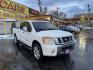 2008 Artic White /Black Nissan Titan LE Crew Cab 4WD SWB (1N6AA07C98N) with an 5.6L V8 DOHC 32V engine, 5-Speed Automatic Overdrive transmission, located at 801 South State Street, Salt Lake City, UT, 84111, (801) 328-0098, 40.751953, -111.888206 - Super clean nice truck! Runs great! 4x4 perfect all year around truck! Clean title no accidents on the Carfax history report! Features: 20 Inch Plus Wheels, Leather Seats, 4WD/AWD, Memory Seat(s), Alloy Wheels, Rockford Fosgate Sound, Front Seat Heaters, ABS Brakes, Automatic Transmission, Power L - Photo#4