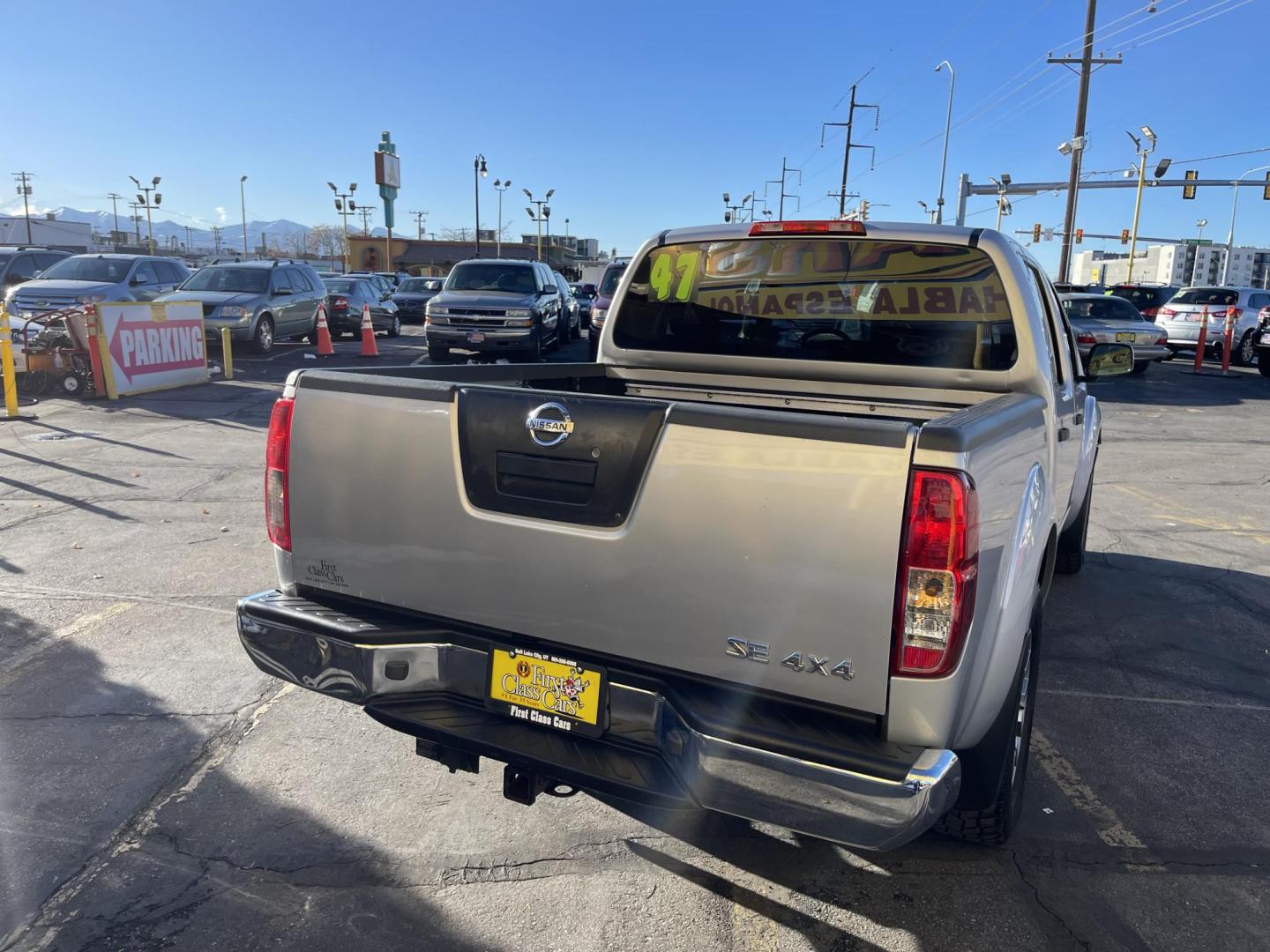 2010 Moondust Silver Metallic /Black Nissan Frontier LE Crew Cab 4WD (1N6AD0EV2AC) with an 4.0L V6 DOHC 24V engine, 5-Speed Automatic transmission, located at 801 South State Street, Salt Lake City, UT, 84111, (801) 328-0098, 40.751953, -111.888206 - Clean title! Hard to find nice 4x4 truck in great shape! Must see for anyone looking for a nice affordable truck! Features: 4x4, Bed Liner, Alloy Wheels, Cloth Seats, ABS Brakes, Automatic Transmission, Overhead Airbags, Traction Control, AM/FM Stereo, Auxiliary Audio Input, Rear Defroster, Air Con - Photo#7