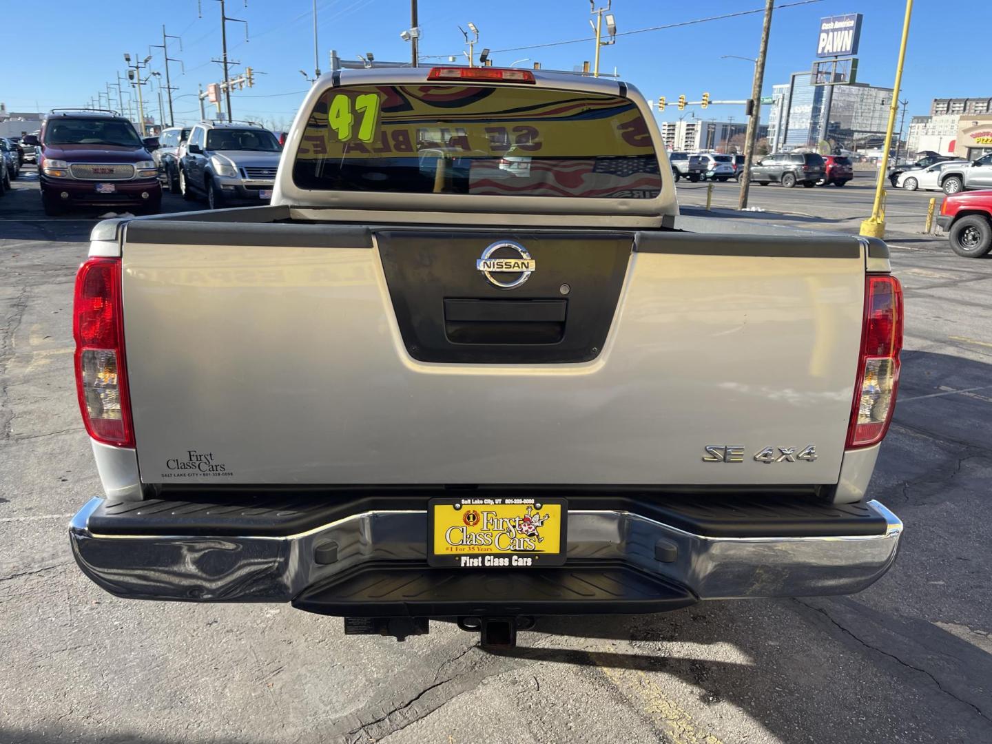 2010 Moondust Silver Metallic /Black Nissan Frontier LE Crew Cab 4WD (1N6AD0EV2AC) with an 4.0L V6 DOHC 24V engine, 5-Speed Automatic transmission, located at 801 South State Street, Salt Lake City, UT, 84111, (801) 328-0098, 40.751953, -111.888206 - Clean title! Hard to find nice 4x4 truck in great shape! Must see for anyone looking for a nice affordable truck! Features: 4x4, Bed Liner, Alloy Wheels, Cloth Seats, ABS Brakes, Automatic Transmission, Overhead Airbags, Traction Control, AM/FM Stereo, Auxiliary Audio Input, Rear Defroster, Air Con - Photo#8