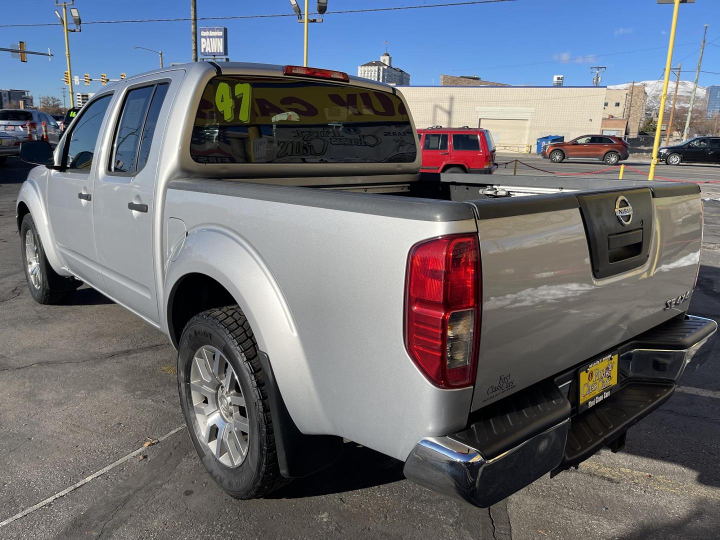 2010 Moondust Silver Metallic /Black Nissan Frontier LE Crew Cab 4WD (1N6AD0EV2AC) with an 4.0L V6 DOHC 24V engine, 5-Speed Automatic transmission, located at 801 South State Street, Salt Lake City, UT, 84111, (801) 328-0098, 40.751953, -111.888206 - Clean title! Hard to find nice 4x4 truck in great shape! Must see for anyone looking for a nice affordable truck! Features: 4x4, Bed Liner, Alloy Wheels, Cloth Seats, ABS Brakes, Automatic Transmission, Overhead Airbags, Traction Control, AM/FM Stereo, Auxiliary Audio Input, Rear Defroster, Air Con - Photo#9