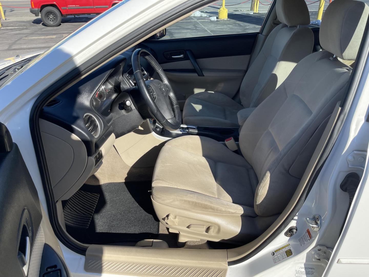 2006 Super White /Tan Mazda MAZDA6 s Sports Sedan (1YVHP80D265) with an 3.0L V6 DOHC 24V engine, Automatic transmission, located at 801 South State Street, Salt Lake City, UT, 84111, (801) 328-0098, 40.751953, -111.888206 - Clean title! Super low miles for the year! Just over 73k miles! Car is in great shape and hard to find this clean with these low miles! Car is immaculate condition hard to find! A must see for anyone looking for a nice clean affordable car that gets great gas mileage! Features: Alloy Wheels, Cloth - Photo#13