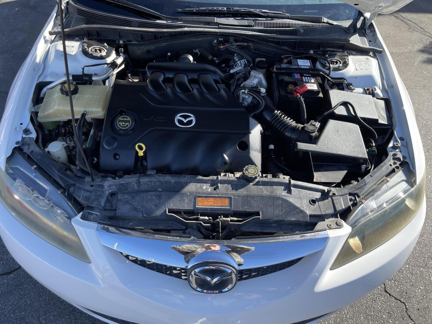 2006 Super White /Tan Mazda MAZDA6 s Sports Sedan (1YVHP80D265) with an 3.0L V6 DOHC 24V engine, Automatic transmission, located at 801 South State Street, Salt Lake City, UT, 84111, (801) 328-0098, 40.751953, -111.888206 - Clean title! Super low miles for the year! Just over 73k miles! Car is in great shape and hard to find this clean with these low miles! Car is immaculate condition hard to find! A must see for anyone looking for a nice clean affordable car that gets great gas mileage! Features: Alloy Wheels, Cloth - Photo#22