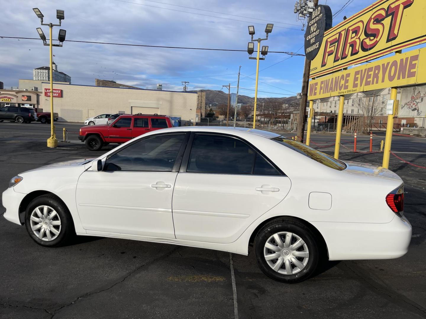 2005 Super White II /Gray Cloth Toyota Camry LE (4T1BE32K55U) with an 2.4L I4 engine, Automatic transmission, located at 801 South State Street, Salt Lake City, UT, 84111, (801) 328-0098, 40.751953, -111.888206 - Life is crazy. Now is the time to buy! All of our prices are just dollars above our cost. These prices will change as soon as life isn't so crazy. So please call or come in. We are here to save you a lot of money! Our service department is OPEN DAILY to help with any of your service needs. P - Photo#8