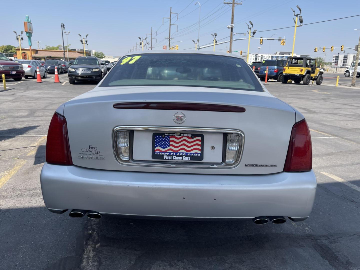 2003 Galaxy Silver Metallic /Gray Leather Cadillac Deville (1G6KD54Y13U) with an 4.6L V8 engine, Automatic transmission, located at 801 South State Street, Salt Lake City, UT, 84111, (801) 328-0098, 40.751953, -111.888206 - Clean Title!! Extra clean!! Immaculate condition!! Free Carfax!! Must see!! Warranty available!! Free Carfax!!! Vehicle Features: Alloy Wheels, AM-FM Radio, CD Player, Cruise Control, Leather Interior, Power Locks, Power Mirrors, Power Seats, Power Steering, Power Windows, Rear Window - Photo#5