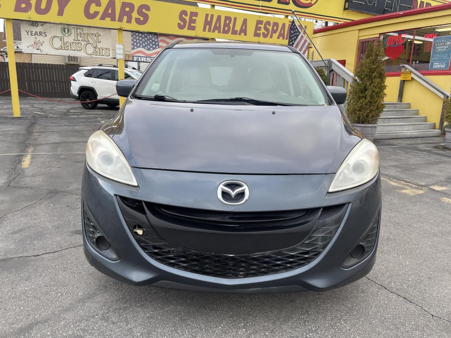 2012 Metropolitan Gray Metallic /Gray Cloth Mazda Mazda5 Sport (JM1CW2BL5C0) with an 2.5L I4 engine, Manual transmission, located at 801 South State Street, Salt Lake City, UT, 84111, (801) 328-0098, 40.751953, -111.888206 - Cool family minivan! Has sliding doors and feels like a miniature minivan. Vehicle Features: Sport Model, 3rd Rear Seat, ABS Brakes, Air Conditioning, Alloy Wheels, AM-FM Stereo, Auxiliary Audio Input, CD Audio, Cloth Seats, Cruise Control, Fold-Away Third Row, Manual Transmission, Overhead Airba - Photo#2